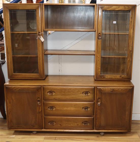 An Ercol Windsor display cabinet W.156cm